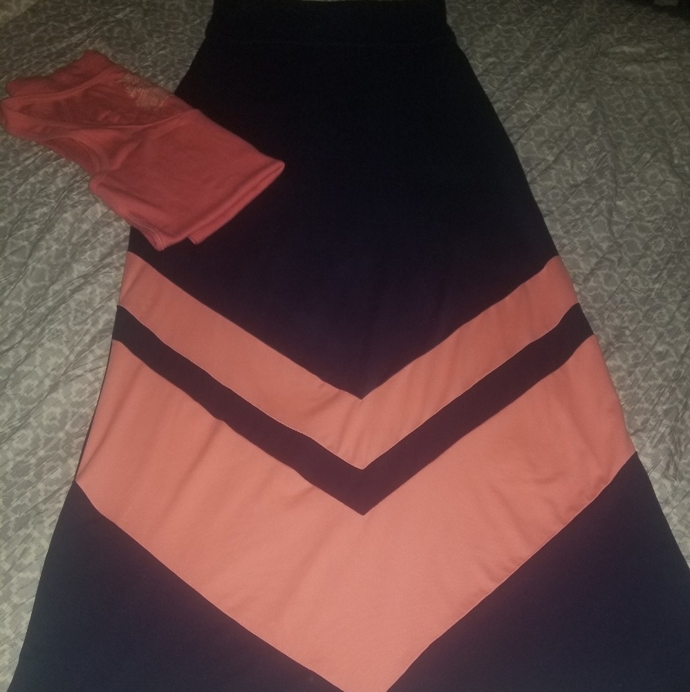 Long navy blue skirt with guava color design inclu